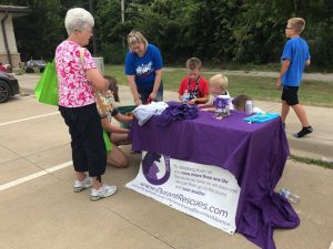 Durant Animal Rescue Alliance's table with guests